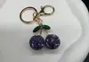 Novo Moda Diamante Cravejado Fruta Imitação Cereja Pingente de Chave Luxo Leve Cereja Criativo Feminino Chaveiro Pingente