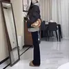 Micro-calças pretas outono e inverno calças boca de sino forradas de fleece jeans femininos 2024 novo cintura alta calças de ferradura pequenas para todas as ocasiões