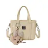 Bolsa de nicho super popular com relevo para primavera e verão para mulheres, nova bolsa transversal versátil da moda 2026, bolsa de mão tipo balde requintada