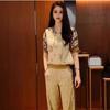 Traje Deportivo Casual Potente para Mujer 2025 Nuevo Patrón Geométrico Estampado en Caliente Manga Corta Pantalón Casual Traje de Dos Piezas para Mujer