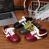 Otoño 2026 Nuevo Moda Infantil Versátil Ligero Suela Blanda Zapatos de Entrenamiento Alemanes Tenis Casuales de Bloques de Color Zapatos Planos