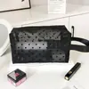 Bolsa de maquillaje portátil con forma de corazón de malla transparente transfronteriza, bolsa de aseo de viaje de gran capacidad, bolsa para lápiz labial de mujer, bolsa para retoques