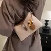 Bolsa de camurça vintage 2026 feminina luxo leve ombro axila transversal outono bolsa de mão nova moda coreana requintada