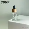 Stock Listo del Fabricante Botella de Vidrio con Gotero de Hombro Inclinado de 30 ml Botella para Mezcla de Aceites Esenciales Embalaje de Viaje para Líquido Esencia Botella Pequeña Vacía