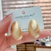 Pendientes Largos de Metal Cepillado con Forma de Gota de Agua Elegantes Estilo Europeo y Americano con un Toque de Lujo, Pendientes de Aguja de Plata de Celebridad de Internet de Lujo Ligero de Nicho, Accesorios Versátiles para las Orejas
