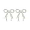 Pendientes de flor con lazo de circonita y pasador de plata 925, pendientes transfronterizos elegantes de lujo ligero, pendientes de perlas modernos y elegantes para mujer