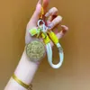 Regalos del Festival del Medio Otoño para Clientes: Pasteles de Luna, Bolsas de la Suerte, Dijes Dorados para Teléfono, Llaveros, Cadenas para Teléfono, Dijes para Bolsos