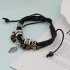 Pulseira Tecida à Mão de Couro Genuíno Casual Vintage Europeu e Americano Estilo Britânico Joias Masculinas e Femininas Moda Versátil Cruz Folhas