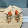 Pendientes Vintage de Flor Gota de Aceite Lujo Ligero Temperamento Diseño de Moda Pendientes de Botón Pendientes Versátiles Venta al por Mayor