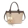 Elegante bolsa tote bicolor para mulheres, nova bolsa de mão estilo vintage 2026, adequada para o dia a dia casual, bolsa versátil e estilosa