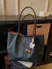 Bolsa Casual Grande Capacidade Yuezi para Mulheres 2026 Primavera Novo Estilo Bolsa de Ombro de Mão de Alto Valor Bolsa Tote para o Dia a Dia