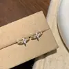 Pendientes de cobre ecológicos de diseño integral, modernos ear cuffs de estrella de cuatro puntas color oro café con barra recta, pendientes de piercing, joyería