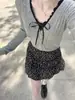 Saia com estampa floral branca para mulheres, novo estilo verão 2026, cintura alta, modeladora, curta estilo A, saia tipo bolo bufante