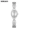 Mokago relógio feminino versátil temperamento mostrador madrepérola pulseira de metal relógio incrustado com strass formato de coração moderno relógio de quartzo atacado