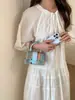 Nueva Mini Bolso Tejido de Nicho de Verano 2026 para Mujer, Bolso de Mano Elegante y Texturizado, Versátil Bolso de Mujer al por Mayor