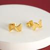 Pendientes de lazo de oro y arena de Vietnam para mujer, pendientes de tendencia Joker con temperamento a la moda, fabricantes de joyas chapadas en oro al por mayor