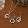 Collar de letras huecas de acero inoxidable nuevo transfronterizo traje hombres y mujeres colgante de acero de titanio aretes joyería de moda europea y americana