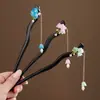 Nuevo Estilo Chino Elegante Tassel de Lirio del Valle Pasador de Pelo Estilo Antiguo Dinastía Han Pasador para Cheongsam Pasador de Madera Imitación Ébano Elegante Adorno para el Cabello para Mujeres