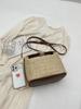 Bolso de Cubo Transfronterizo de Comercio Exterior Tejido de Paja Bolso Pequeño Casual para Mujer Bolso Portátil de Hombro Cruzado Primavera 2024 Nuevo