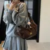 Bolso de Mujer de Gama Alta con Forma de Cuerno 2026 Nuevo Vintage Gran Capacidad Bolso Cruzado de Nicho Bolso Tote de Nicho para el Trabajo