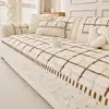 Cojines de sofá color crema estilo coreano, nueva colección invierno 2026, cojines de asiento de felpa engrosada, fundas de sofá antideslizantes y cálidas, venta al por mayor