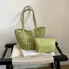 Bolso cubo tejido hueco casual de nicho coreano transfronterizo para mujer, nuevo bolso de hombro para axila de verano 2026 para ir al trabajo