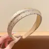 Diadema de lunares estilo coreano de ala ancha para mujer, de alta gama, elegante, moderna, accesorio para el cabello de moda para uso diario, diadema de corona alta