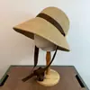 Sombrero de Paja Tejido Nuevo Producto Transfronterizo Alta Calidad Copa Redonda de Atar Estilo Francés Ala Ancha Sombrero de Protección Solar Fábrica Mayorista Sombreros para Mujer