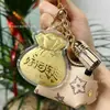 Enfeite Fortuna Dourada, Riqueza de Todas as Direções, Pulseira para Celular em Ouro Puro 999, Chaveiro Bolsa da Fortuna, Decoração para Pendurar no Carro, Presente para Atrair Riqueza
