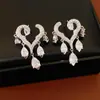 Pendientes de Plata Electropulida en Oro Real de 18K con Borlas de Gota de Agua en Forma de Corazón de Circonia, Pendientes Exquisitos con un Toque de Lujo Ligero y de Alta Gama