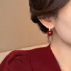Pendientes Ankora de Perla Roja para Mujer, Únicos y de Alta Gama, Elegantes Pinzas para Orejas, Nuevos Pendientes de Otoño e Invierno Adecuados para Usar Durante el Año Nuevo