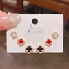 Exquisitos Pendientes de Flor de Cuatro Hojas Flor de Circonita de Alta Gama Tres Pares de Lujo Accesible Estilo Coreano Aguja de Plata Pendientes Super Brillantes Set de 6 Piezas
