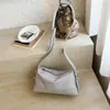 Bolsa Baguete de Nicho Estilo Coreano de Alto Valor para Mulheres Verão 2026 Nova Moda Minimalista Cor Sólida Bolsa de Ombro Único para Sobrancelha