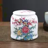 Tetera de cerámica grande con paisaje a prueba de humedad pintada a mano tanque de almacenamiento sellado general tamaño pequeño tarro de porcelana blanca té verde Pu'er