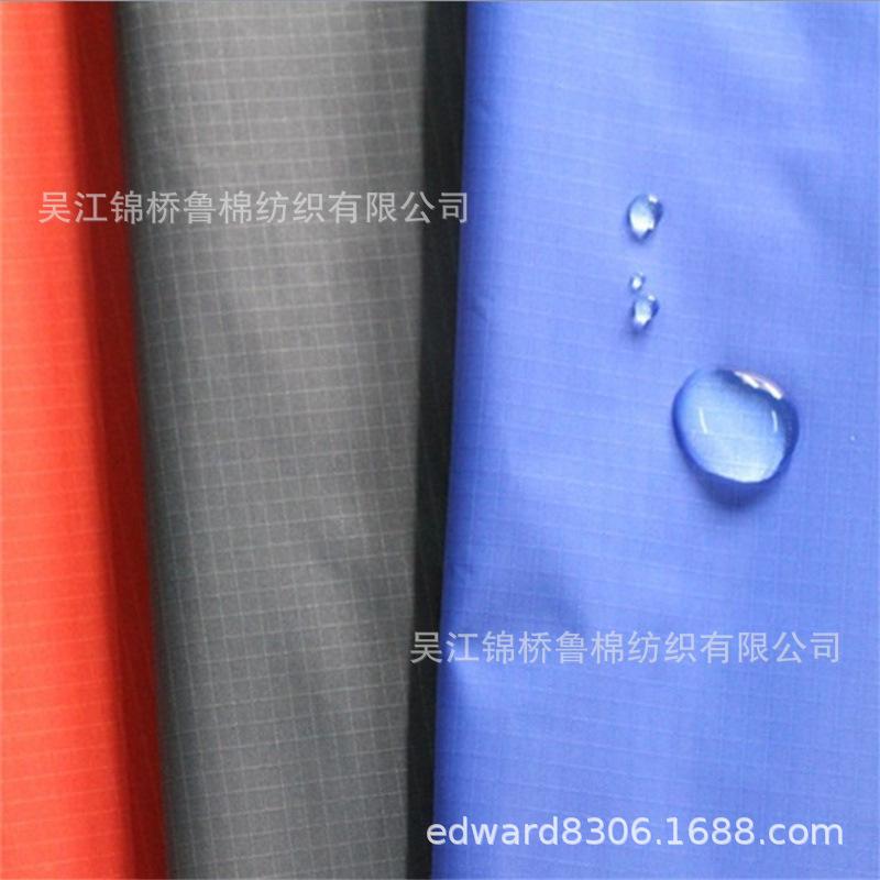 格子尼丝纺化纤布料防水_副本.jpg