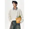 Moda Masculina Nueva Otoño 2026: Camiseta de Manga Larga con Cuello Polo de Corte Holgado con Diseño Falso de Dos Piezas y Cuello de Cuadros en Contraste