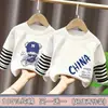 Camiseta de Manga Comprida para Meninos Estilo Primavera e Outono 2026 Novas Roupas de Outono para Crianças Camiseta Outono Algodão Puro Falso Duas Peças Listrada Camada Base