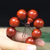 Pulsera de cuentas de sándalo rojo pera de cártamo pequeña mercancía más vendida fabricantes de pulseras de cuentas venta al por mayor