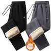 Pantalones casuales gruesos con forro de polar para otoño e invierno de hombre, pantalones de lana de cordero, pantalones deportivos de corte holgado, pantalones rectos de algodón cálido