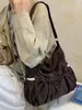 Bolso de hombro a cuadros retro estilo coreano, nueva moda 2026, con detalle de lazo, ofreciendo un look relajado y casual, adecuado para uso en exteriores
