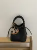 Bolsa de Mano Cruzada Primavera y Verano Nuevo 2026 Coreana de Nicho Bolsa de Empanada Bolso Tejido Bolso Cubo con un Toque de Lujo y Diseño Exquisito Bolso Cruzado