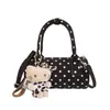 Bolso de mano de lunares de lujo ligero estilo coreano para mujer, principios de otoño de 2026, bolso tipo almohada versátil de nicho con sensación de alta gama, bolso de hombro y cruzado