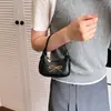 Bolsa infantil con lindo lazo, bolso de mano para bebé, mini bolso compacto de media luna, bolso de cadena simple de color liso para niños y niñas