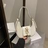 Grande capacidade retro elegante bolsa crescente outono e inverno nova moda borla bolsa de ombro leve luxo all-match bolsa de axila atacado