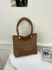 Bolsa Tote Transfronteiriça Textura Tecida Retrô Feminina 2026 Nova Moda de Alto Padrão Versátil para o Dia a Dia Ombro Único Sob o Braço Tendência