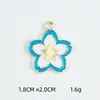 Joyería de aleación estilo coreano Accesorios diy Flor de cerezo Flor de cinco pétalos Colgante de collar Pulsera Colgante individual Colgante pequeño Colgante individual Venta al por mayor