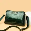 Colección nueva 2026: Bolso de mano elegante y versátil para mujer con acabado brillante tipo piel de cocodrilo, perfecto como bolso de hombro, bolso cruzado o tote para el día a día, con un diseño pequeño y cuadrado