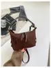 2026 Nova Bolsa de Almofada de Veludo Camurçado Bolsa de Mão Nicho Retrô Bolsa Feminina Simples Versátil Bolsa de Ombro Transversal