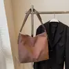 Bolsa de Camurça Grande Capacidade Casual para o Dia a Dia de Mulheres 2025 Nova Versátil Bolsa de Ombro Relaxada Bolsa Tote