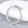 Anel de borboleta esmaltado em prata de lei maciça S925 3mm com cravação oca para diamante de fundo pontiagudo, gradiente de tons frios azul gelo